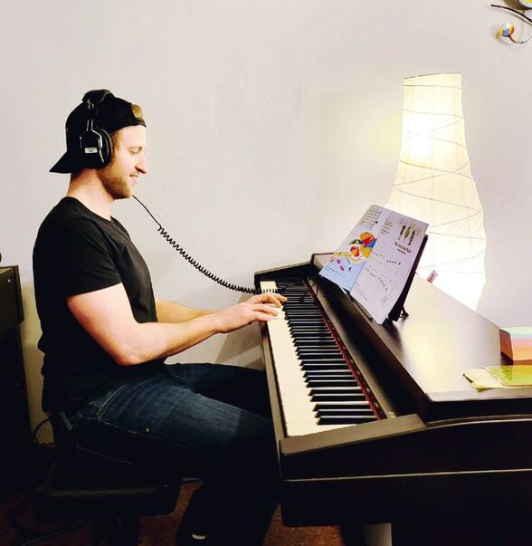 Picture of our instructor and founder, Sam Barsi testing out our newest Roland keyboard and making sure it is class and lesson ready! 